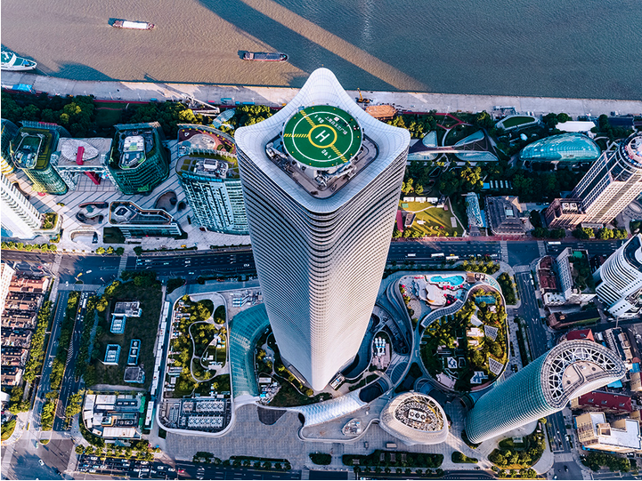 Representation of a massive skyscraper with a helicopter landing pad on the very top, that is the centre of the Sinar Mas Plaza in Shanghai, China. From website “APP Group grow together with Shanghai.” http://sinarmasplaza.com/en/about.aspx